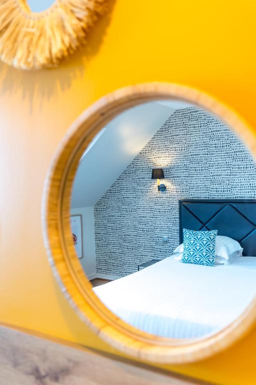 Postel nebo postele na pokoji v ubytování Hôtel La Baie des Anges SPA marin