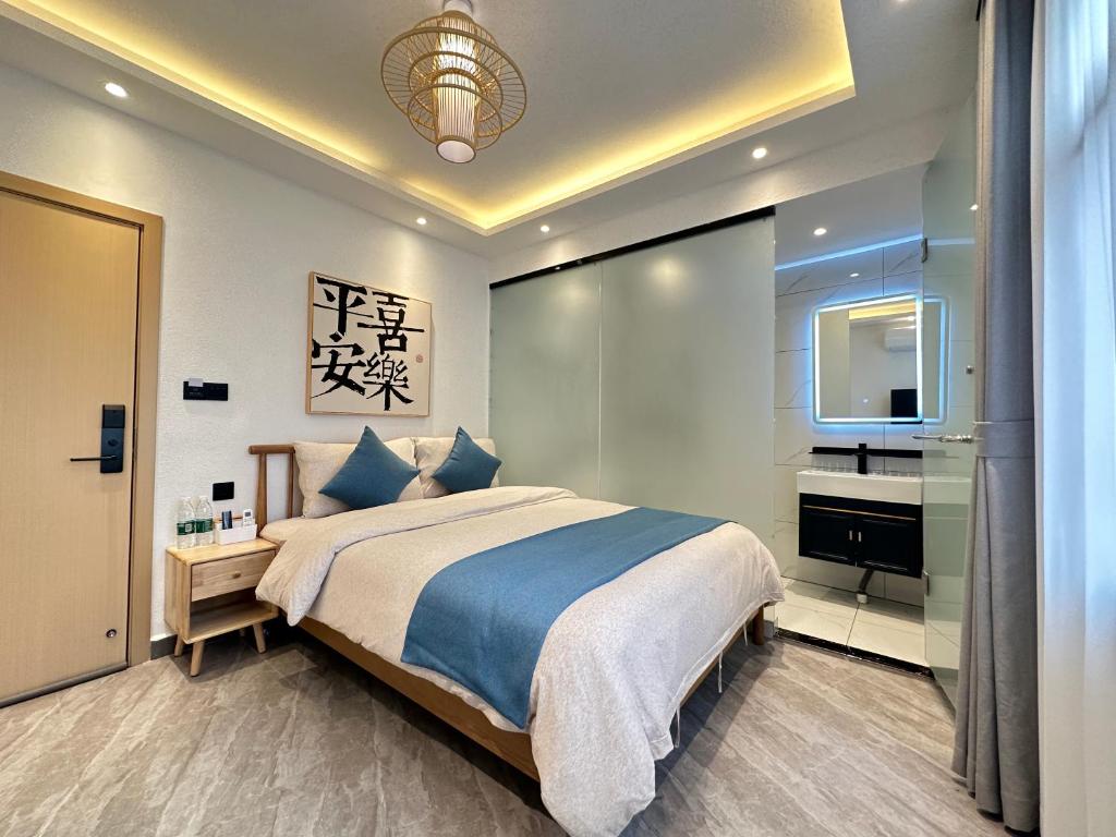 Postel nebo postele na pokoji v ubytování Yifangyan - Tingyuan Qingshe Hostel