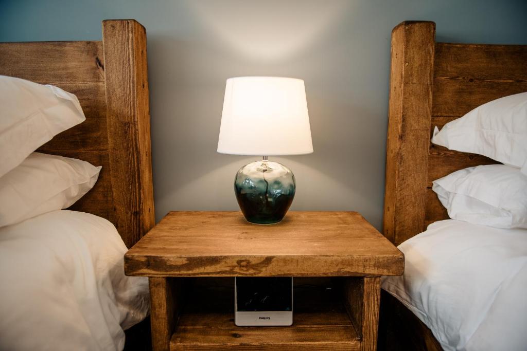 Postel nebo postele na pokoji v ubytování Otterburn House