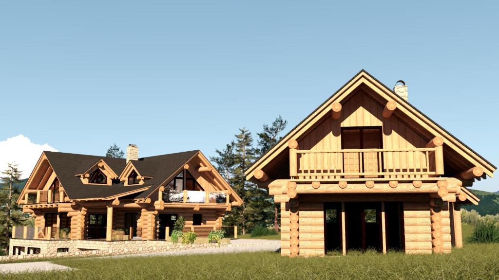 a log home with a balcony and a deck at Grand Chalet Donovaly in Donovaly