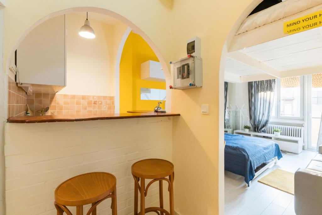 Posteľ alebo postele v izbe v ubytovaní Sunny Studio with balcony in Party District