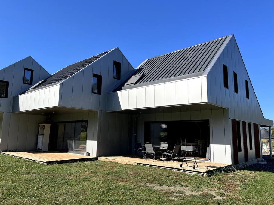 a large house with black and white at Le Sailhet, maison de vacances in Pierrefitte-Nestalas