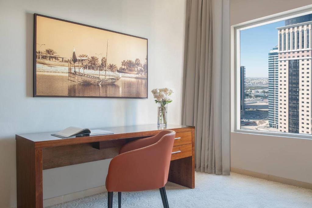 TV a/nebo společenská místnost v ubytování Marriott Executive Apartments City Center Doha