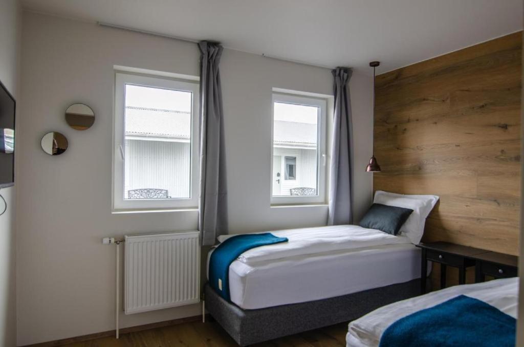 Postel nebo postele na pokoji v ubytování Stracta Apartments