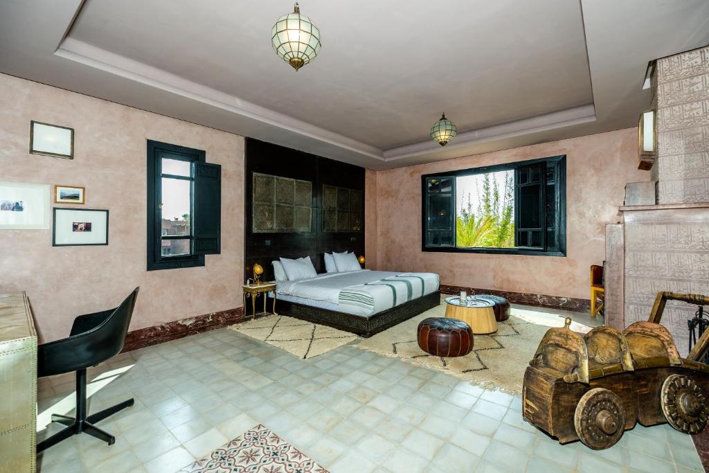 Postel nebo postele na pokoji v ubytování Fellah Hotel