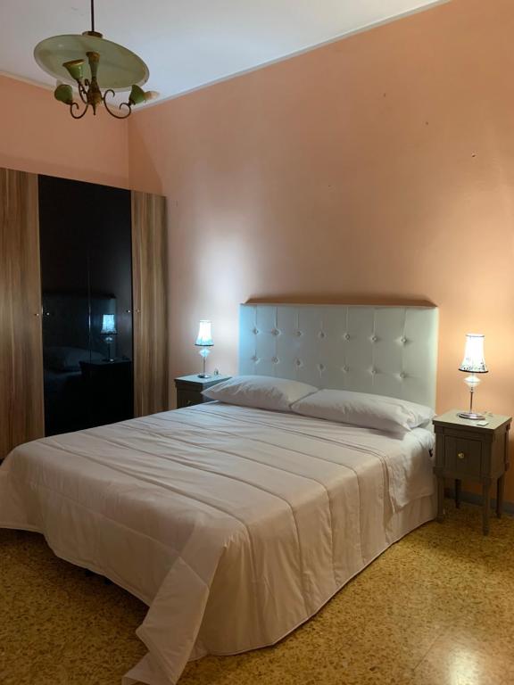 Postel nebo postele na pokoji v ubytování PRINCIPE ROOMS