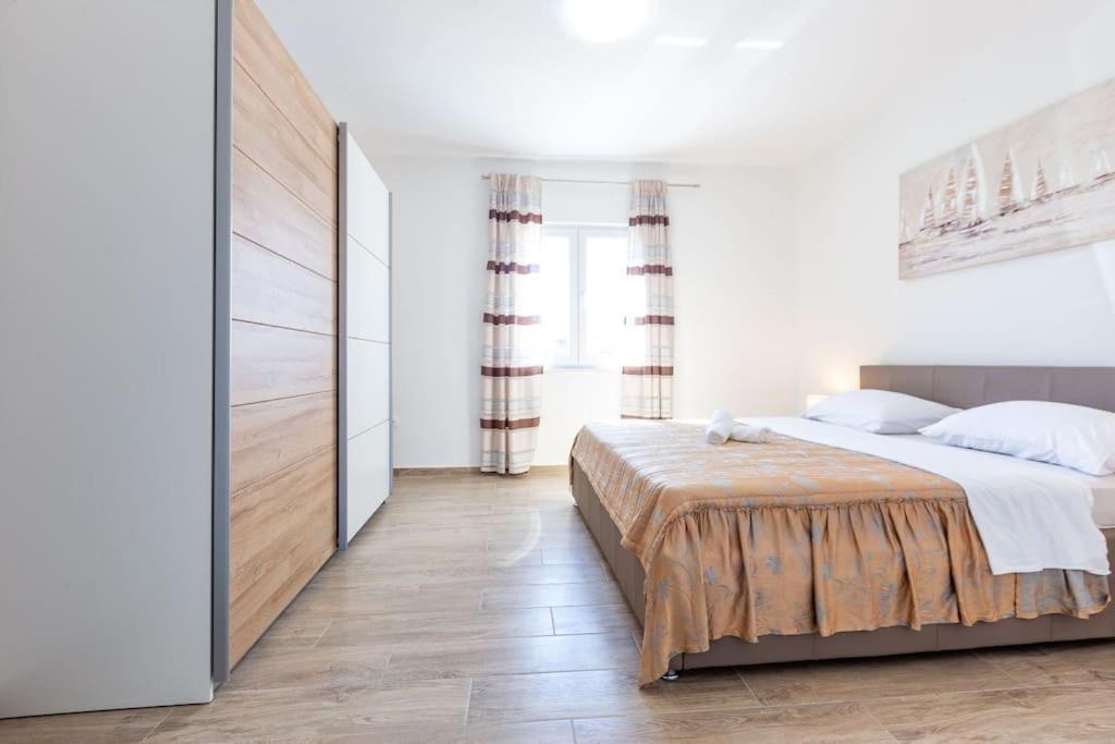 Posteľ alebo postele v izbe v ubytovaní Silvija Holiday Home