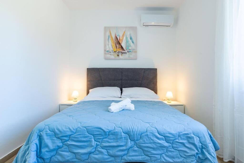 Posteľ alebo postele v izbe v ubytovaní Silvija Holiday Home