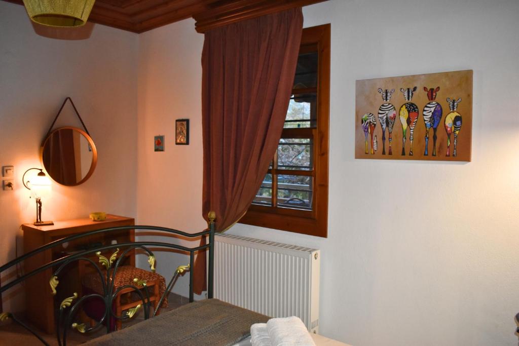 Postel nebo postele na pokoji v ubytování Lila's Guest House