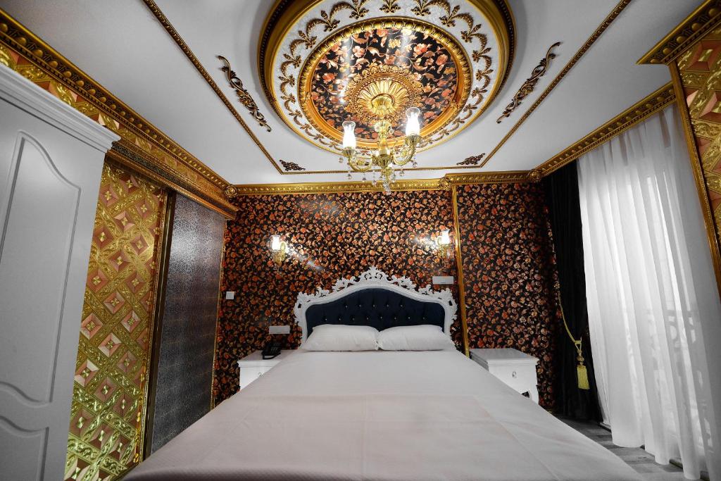 Postel nebo postele na pokoji v ubytování Fatih Babel Park Hotel