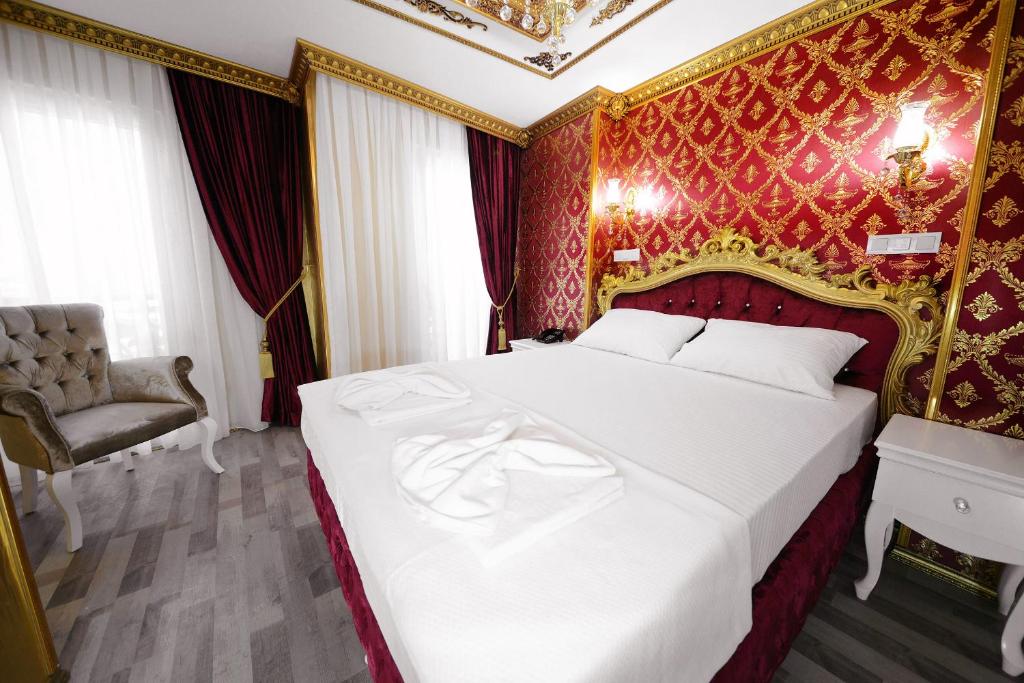 Postel nebo postele na pokoji v ubytování Fatih Babel Park Hotel