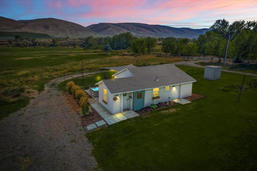 an overhead view of a white house in a field at The Ahtanum Cottage - hot tub and views in Yakima