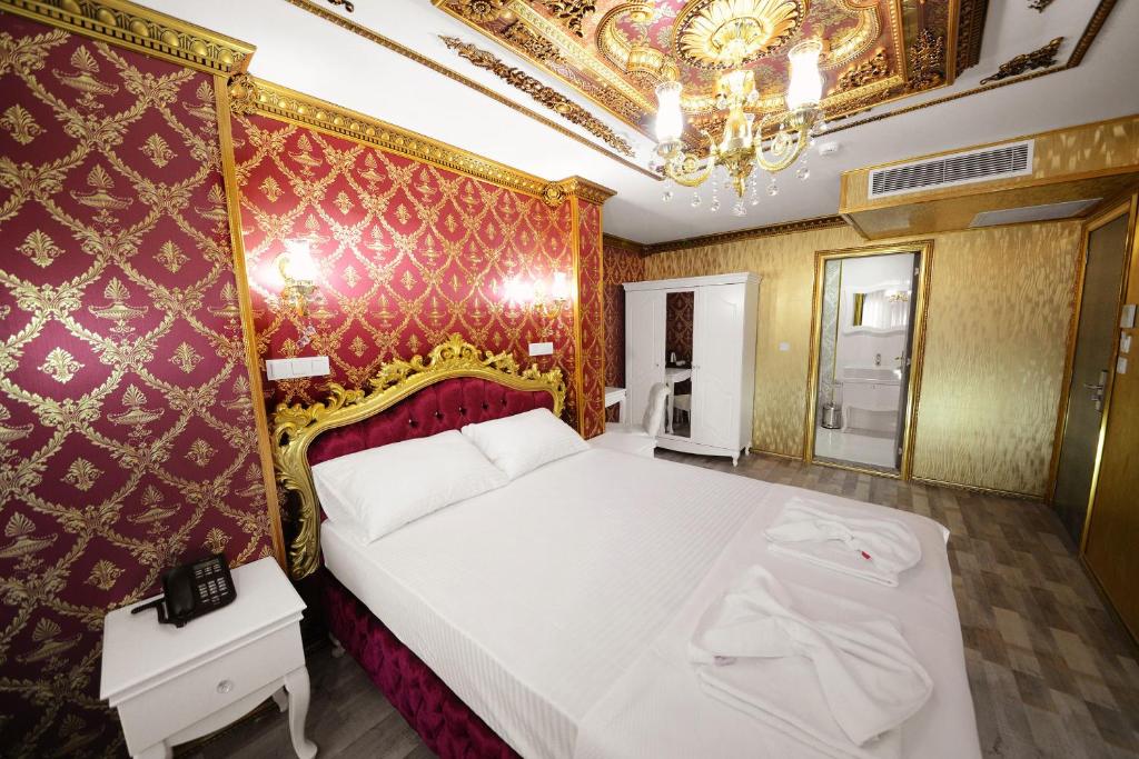 Postel nebo postele na pokoji v ubytování Fatih Babel Park Hotel