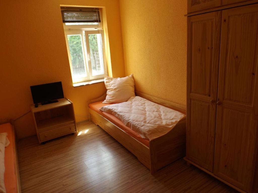 Postel nebo postele na pokoji v ubytování Pension Rego