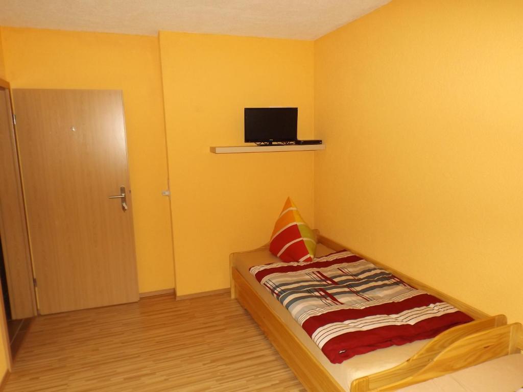Postel nebo postele na pokoji v ubytování Pension Rego