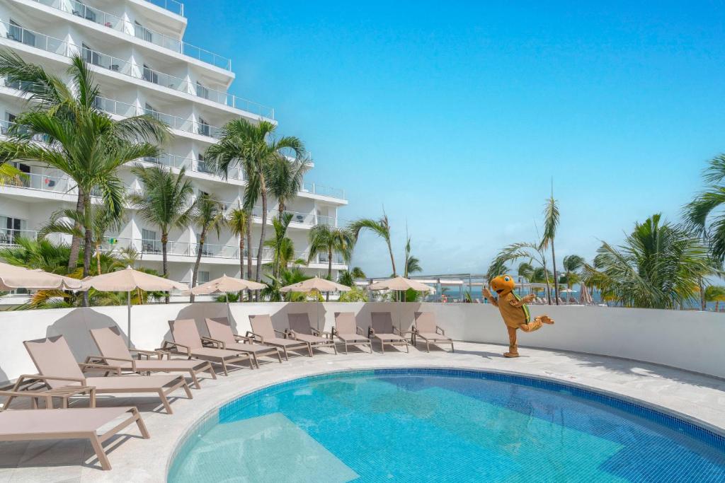 Bazén v ubytování Riu Caribe - All Inclusive nebo v jeho okolí
