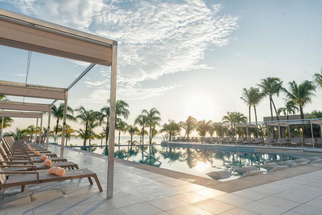 Bazén v ubytování Riu Caribe - All Inclusive nebo v jeho okolí