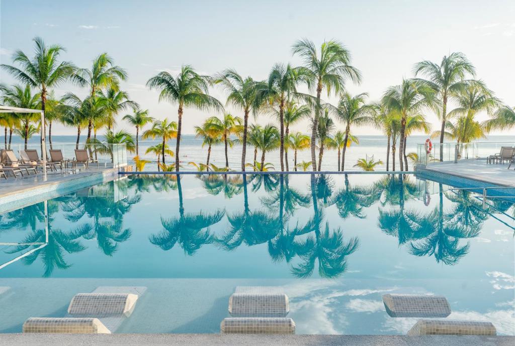 Bazén v ubytování Riu Caribe - All Inclusive nebo v jeho okolí