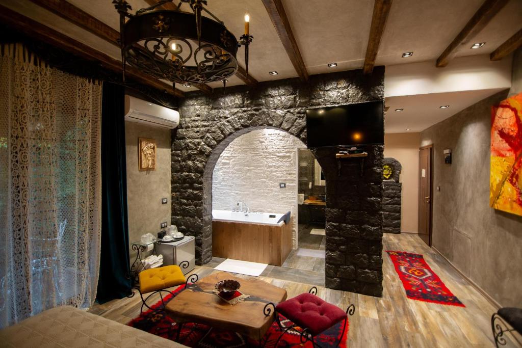 Postel nebo postele na pokoji v ubytování Vila Eden Boutique Hotel