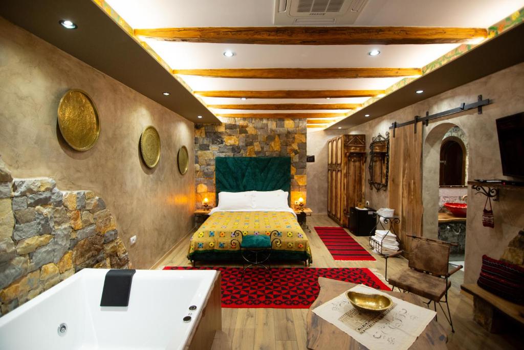 Postel nebo postele na pokoji v ubytování Vila Eden Boutique Hotel