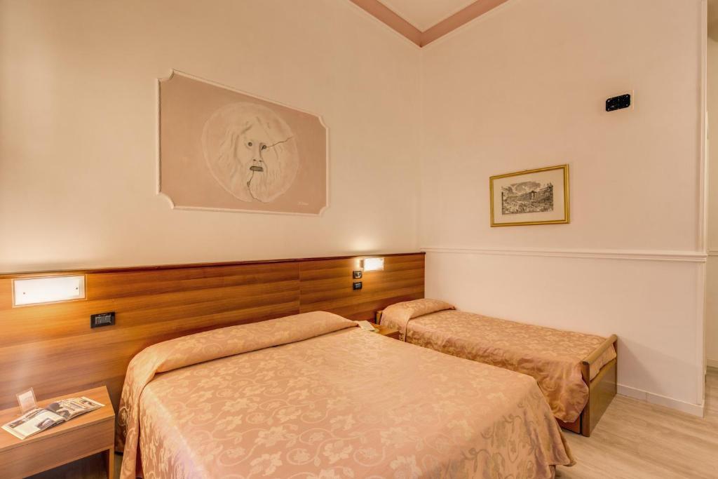 Hotel Martini - Vierpersoonskamer