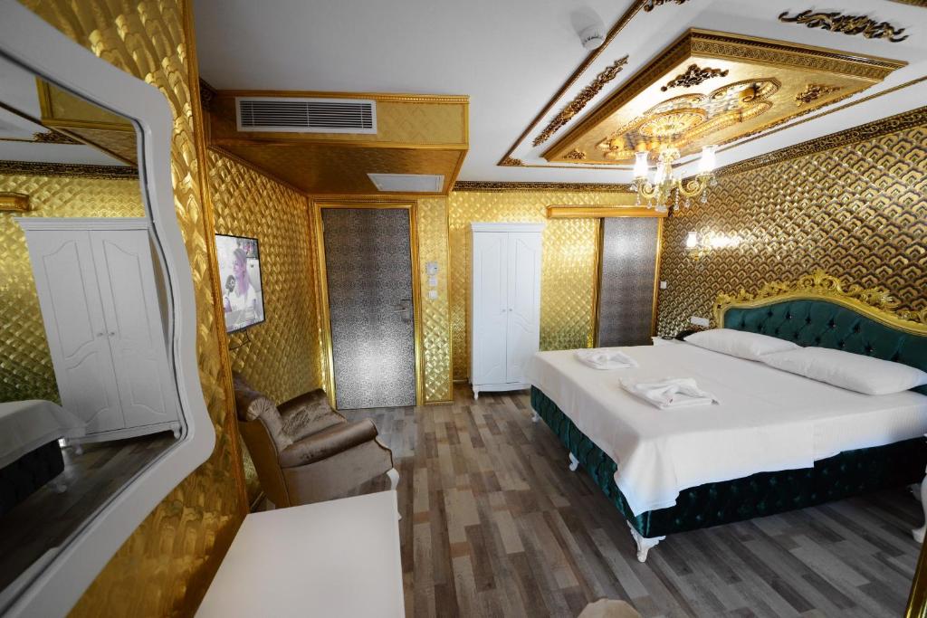 Postel nebo postele na pokoji v ubytování Fatih Babel Park Hotel