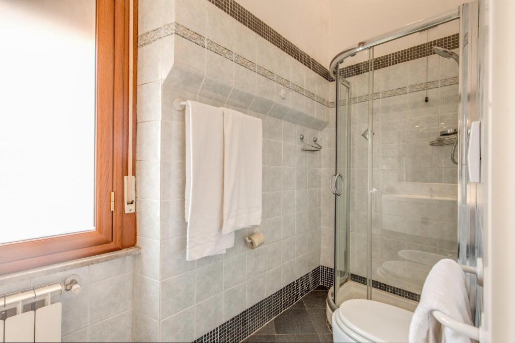 Koupelna v ubytování Hotel Martini