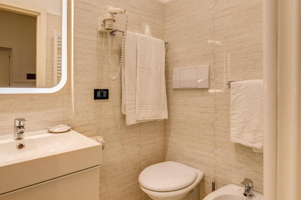 Koupelna v ubytování Hotel Martini