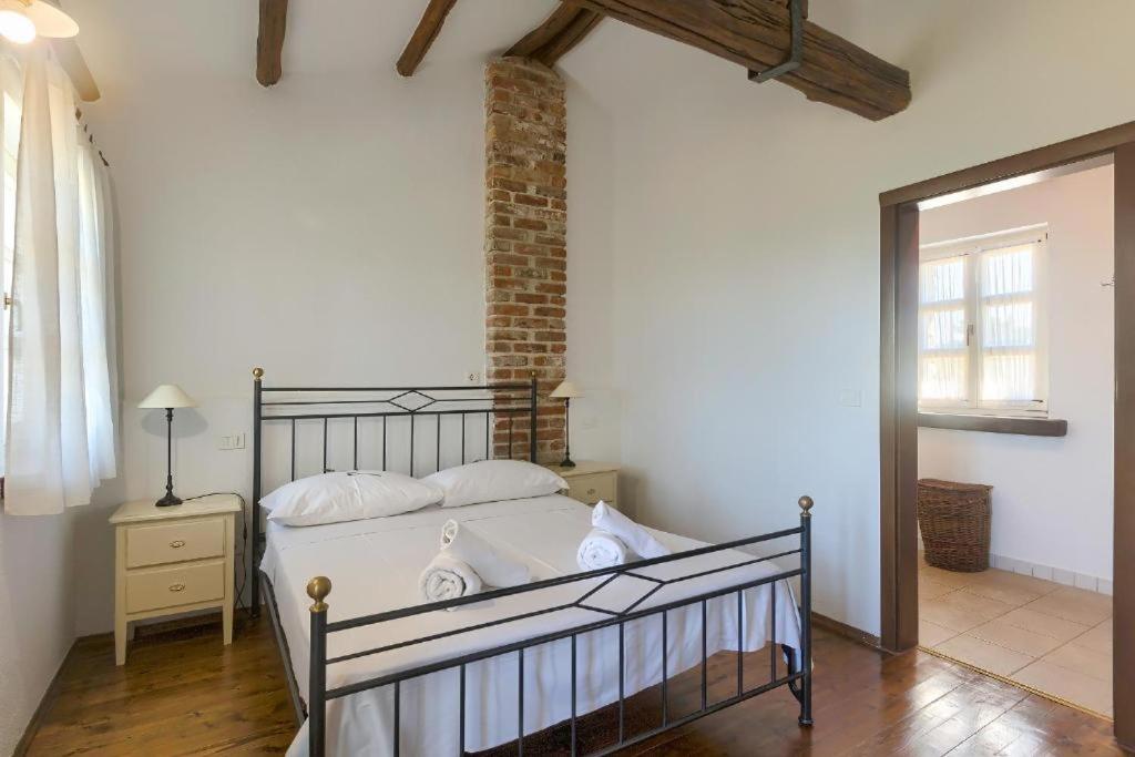 Postel nebo postele na pokoji v ubytování Villa Olivetta by Istrian Country Houses