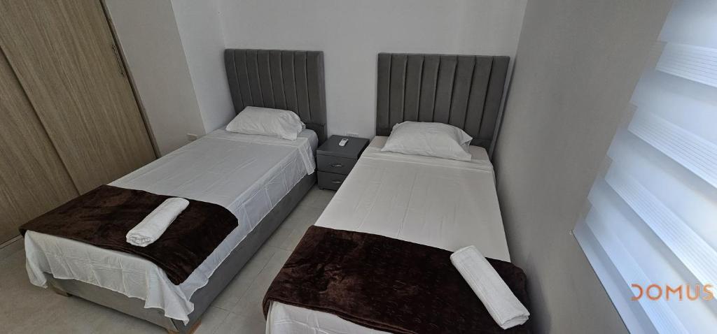 Postel nebo postele na pokoji v ubytování Rooftop Cerca al Rio Guatapuri Vista Panoramica