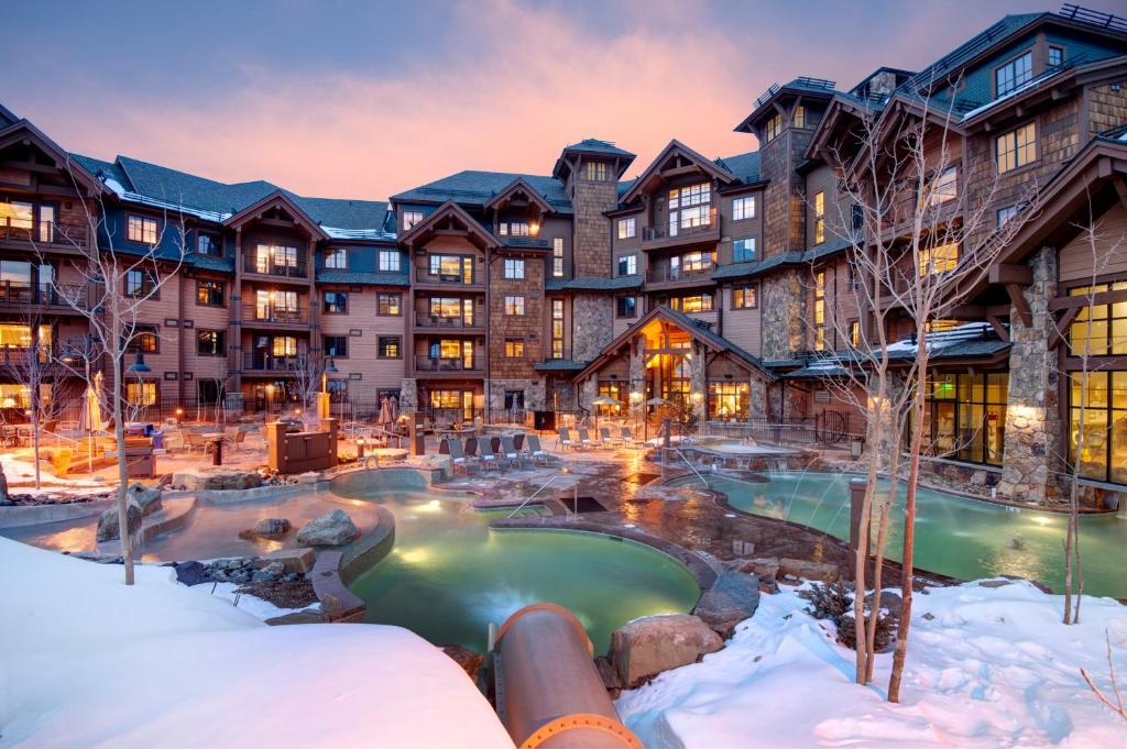 an exterior view of a resort in the snow at Grand Lodge on Peak 7 in Breckenridge