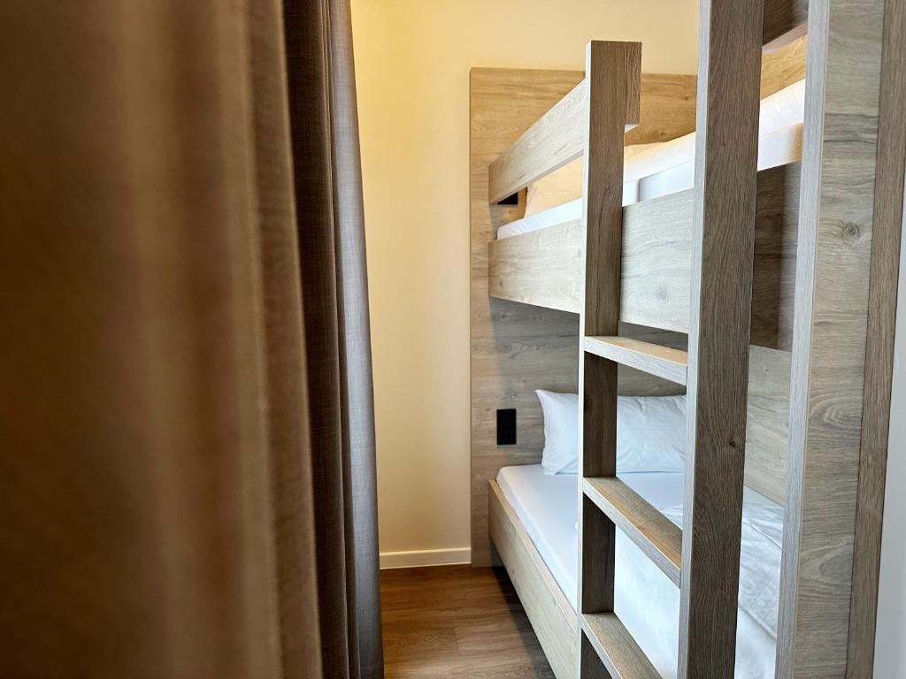 DiMas Hotel Ettenheim - Rustにあるベッド