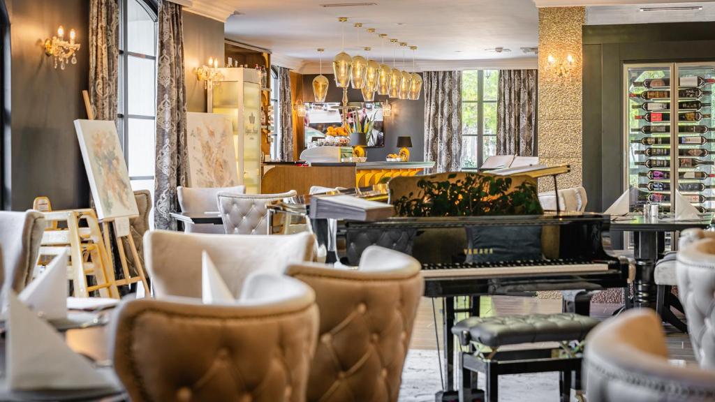 Posedenie v ubytovaní Boutique Hotel Bora & Villas Garamm