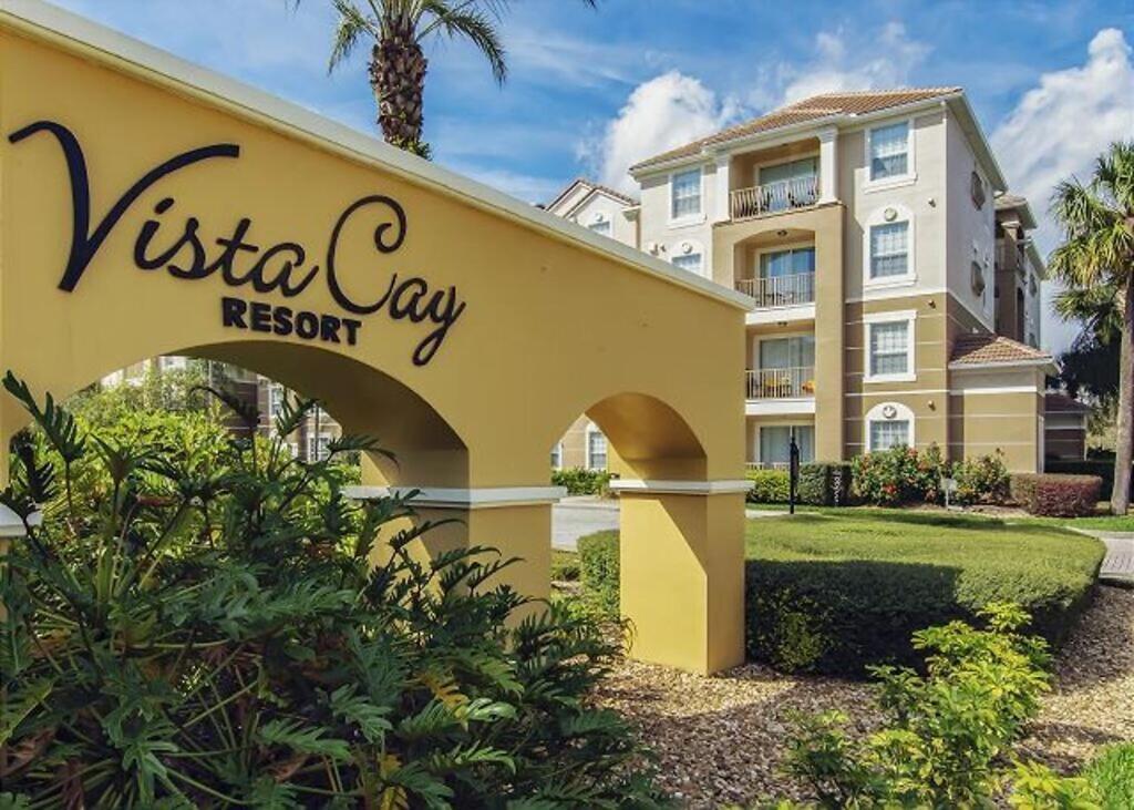 un letrero para un complejo diurno de villa en Vista Cay Getaway Luxury Condo by Universal Orlando Rental en Orlando