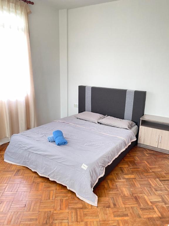 Postel nebo postele na pokoji v ubytování Anna温馨公寓式的住宅