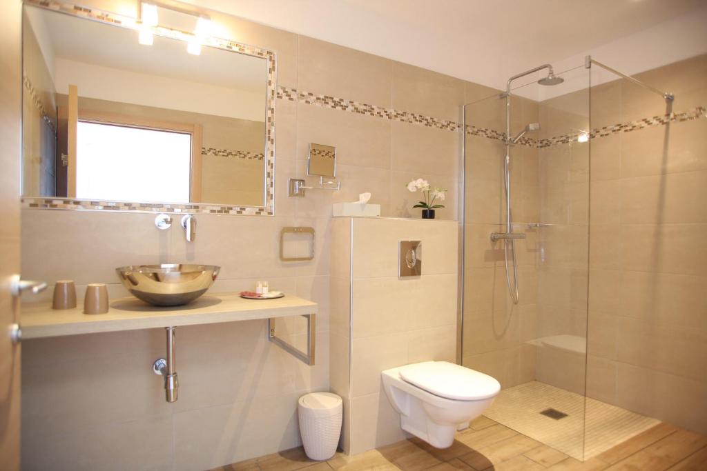 Koupelna v ubytování Hotel Beau Rivage