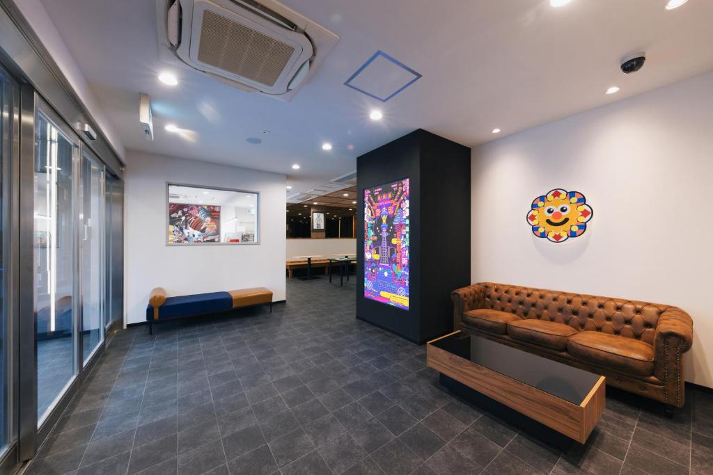 TV a/nebo společenská místnost v ubytování OKINI HOTEL namba