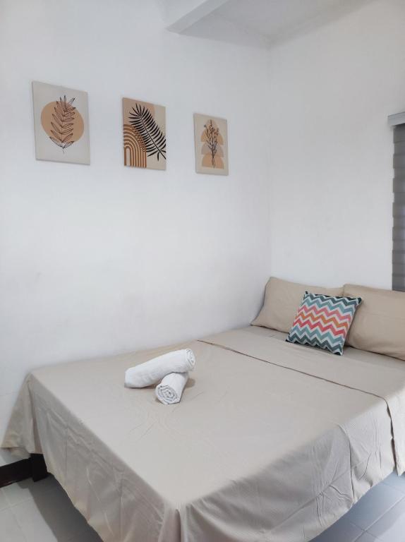 Postel nebo postele na pokoji v ubytování Aloha Hostel Siargao