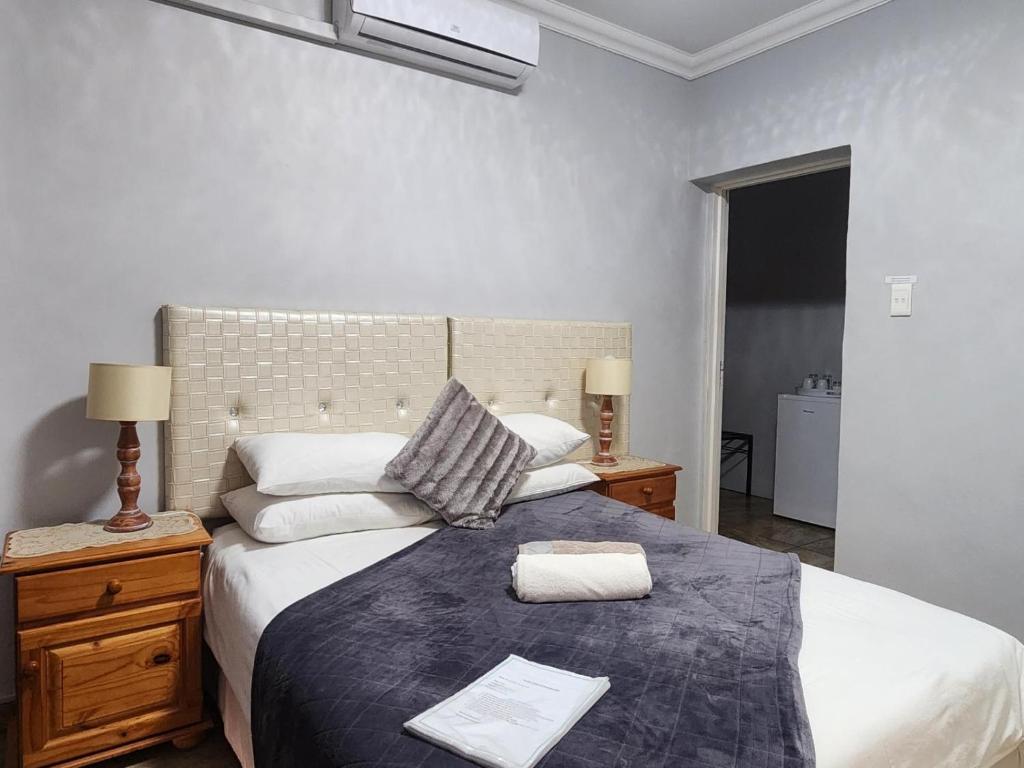 Postel nebo postele na pokoji v ubytování Agros Guest House