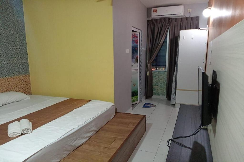 Postel nebo postele na pokoji v ubytování Aeon Tebrau Apartment Johor Bahru - By Room -