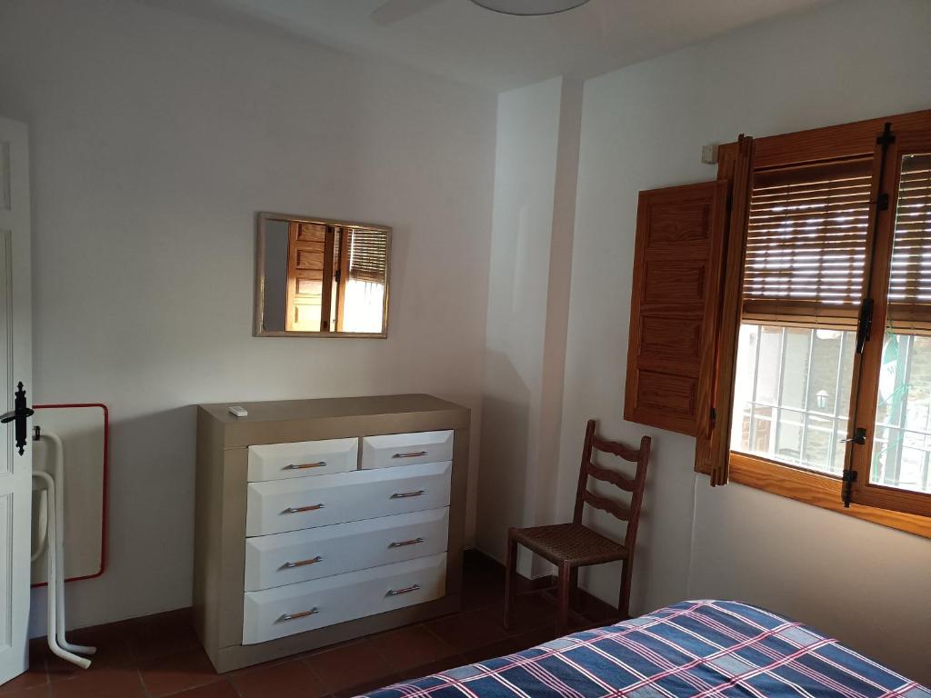 Postel nebo postele na pokoji v ubytování Casa Pepa
