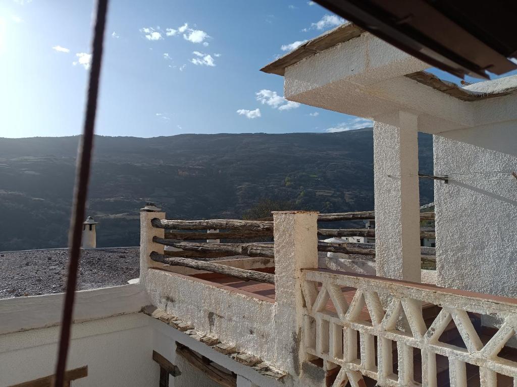 a view from the balcony of a house at Casa Pepa in Bubión