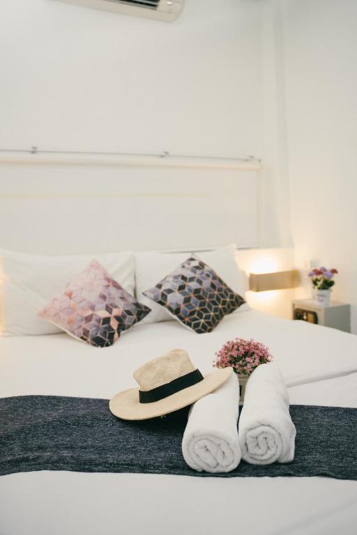 Postel nebo postele na pokoji v ubytování Qilombo Hostel Silom - HQ