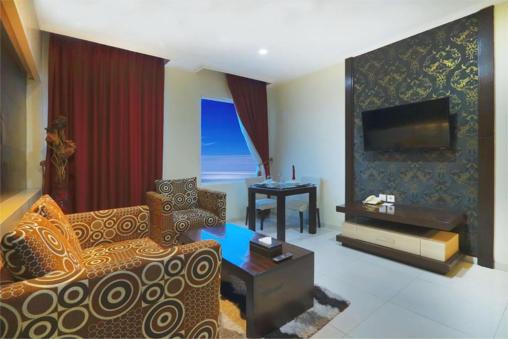 Posezení v ubytování Hotel Dafam Pekalongan
