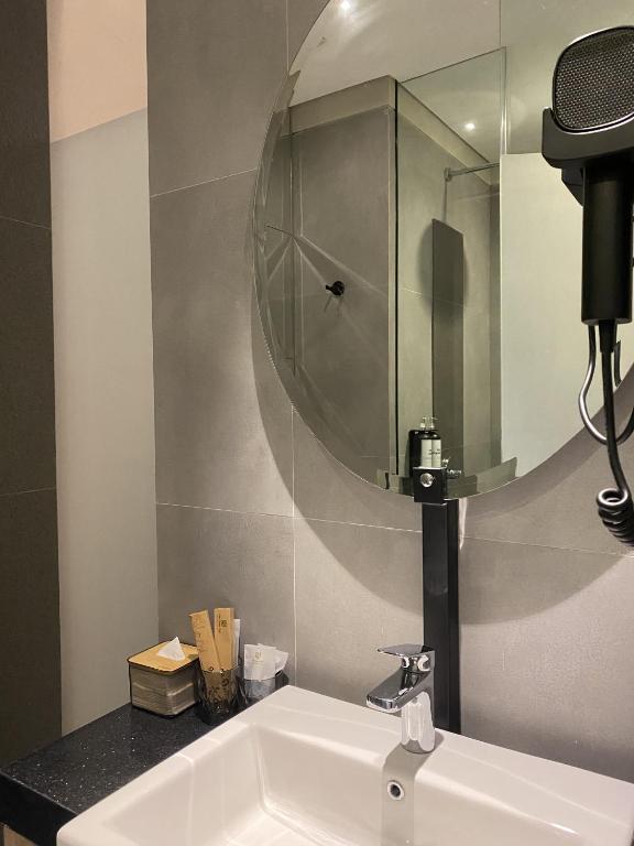 Koupelna v ubytování Posto Dormire Sudirman
