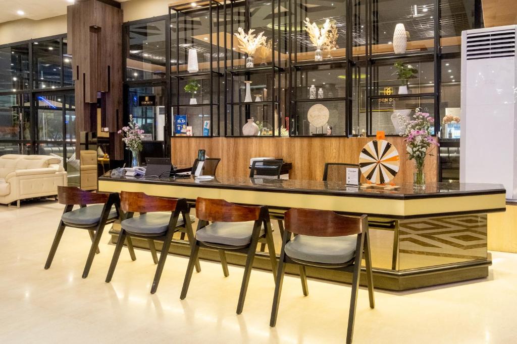 Posezení v ubytování Premiere Hotel Tegal