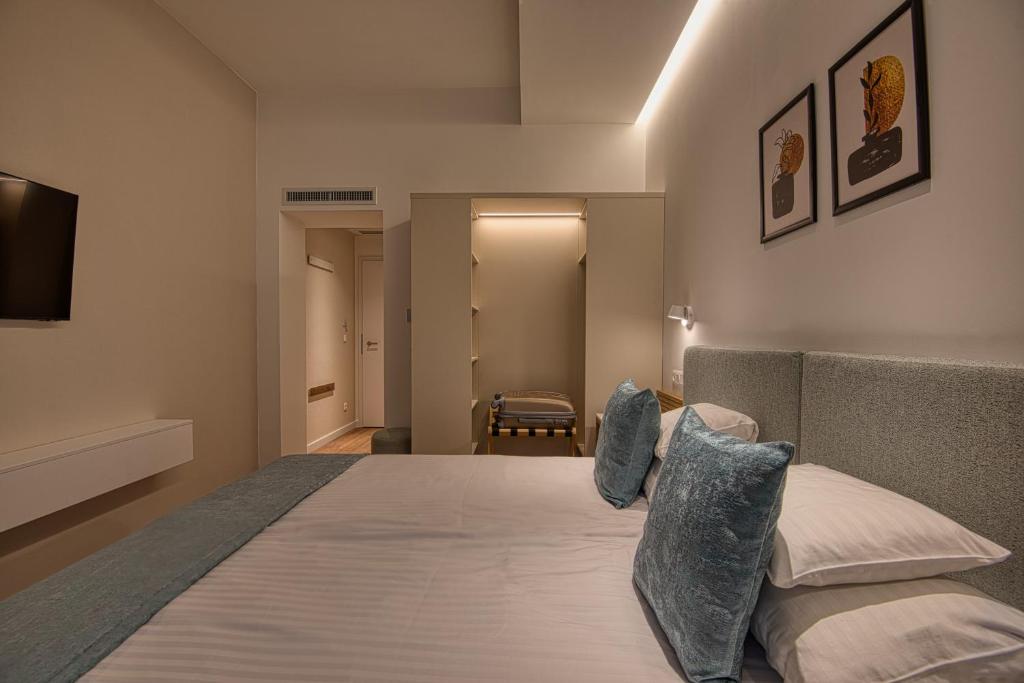 Postel nebo postele na pokoji v ubytování Cardoner Hotel és Konferenciaközpont