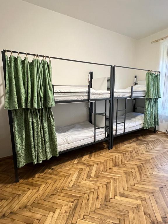 Postel nebo postele na pokoji v ubytování Hostel DO-RE-MI
