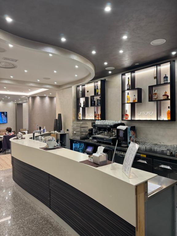 TV a/nebo společenská místnost v ubytování Hotel Vittoria