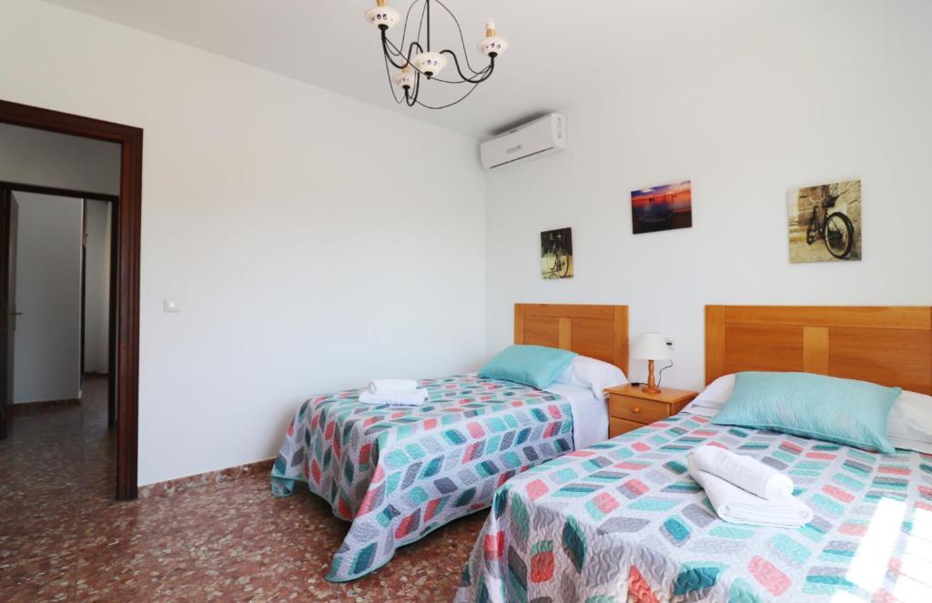 Postel nebo postele na pokoji v ubytování Villa el Romeral SpainSunRentals 1112